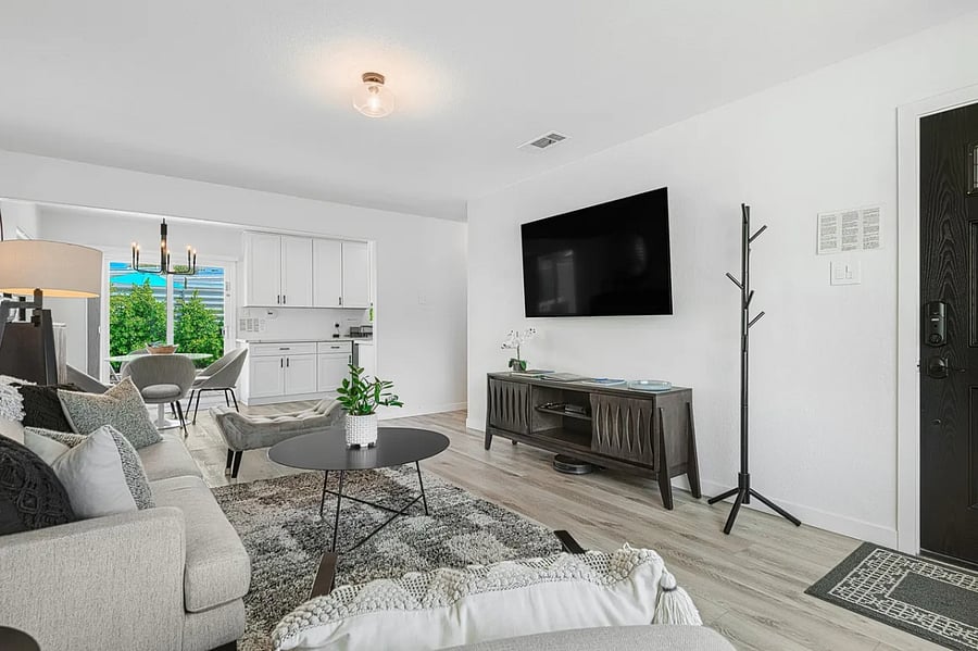 Kick back in the living room with a 65" smart TV. Perfect for movie nights or binge sessions.