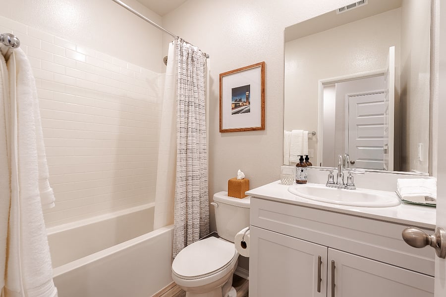 3rd Floor | Bedrooms 2 + 3 share | Full bathroom with shower and bathtub