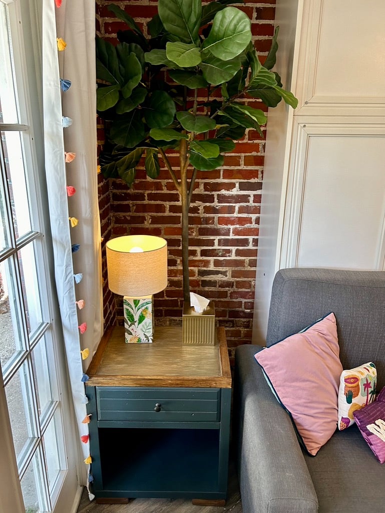 Spacious side table that can be used for additional storage.