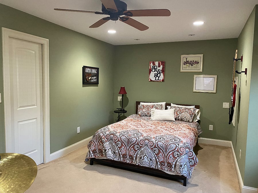 The bedroom has a queen size bed and walk in closet. it also offers a dedicated area with built in desk/computer station.