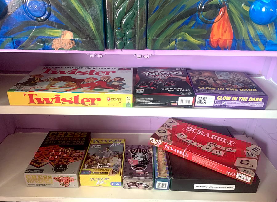 Board games, coloring pages, puzzles can be found in the living room.