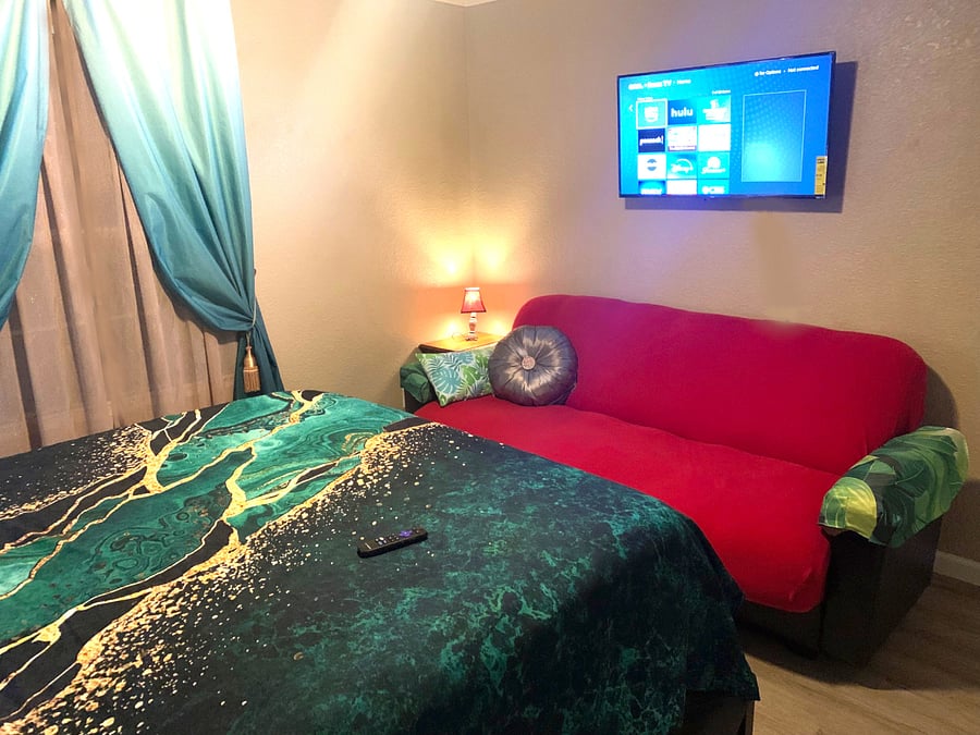 Sofa Sleeper just pulls away from the wall, fold it in half, push up and it will then fold flat. Lift the edge of the couch to open it and access the bedding stored inside of it. You will find a fitted sheet, flat sheet, two pillows and a blanket.