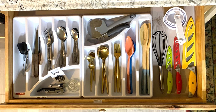 The fully equipped kitchen includes all necessary utensils.