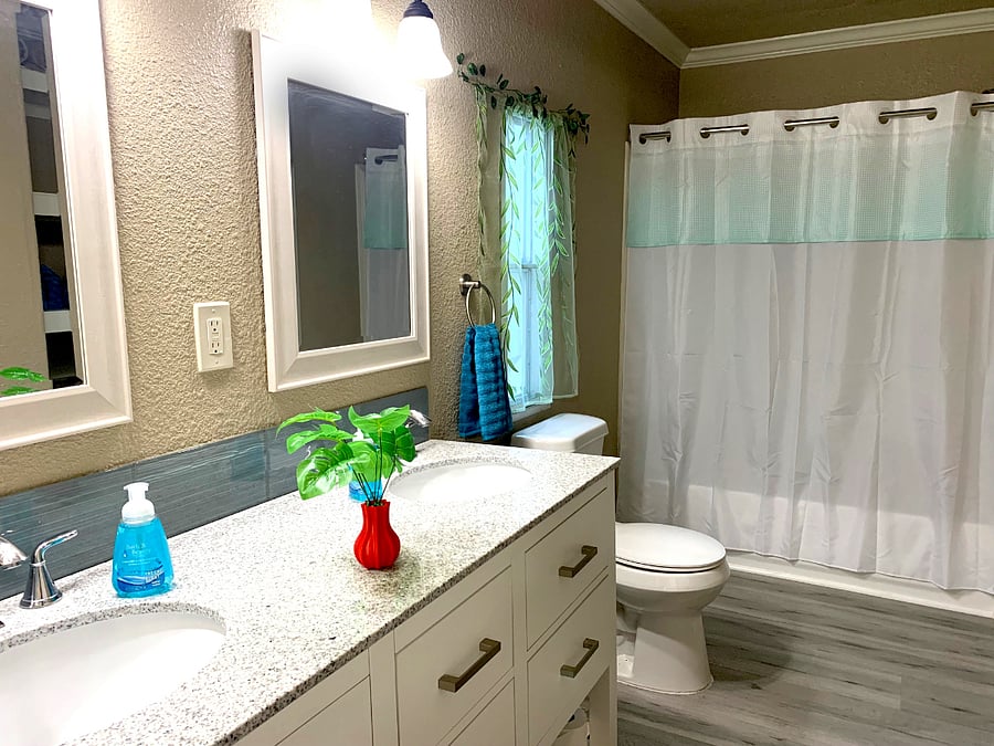 Master bathroom included hand soap, shampoo, conditioner, body wash, bath towels, hand towel, washcloths, slippers, tissue, toilet paper