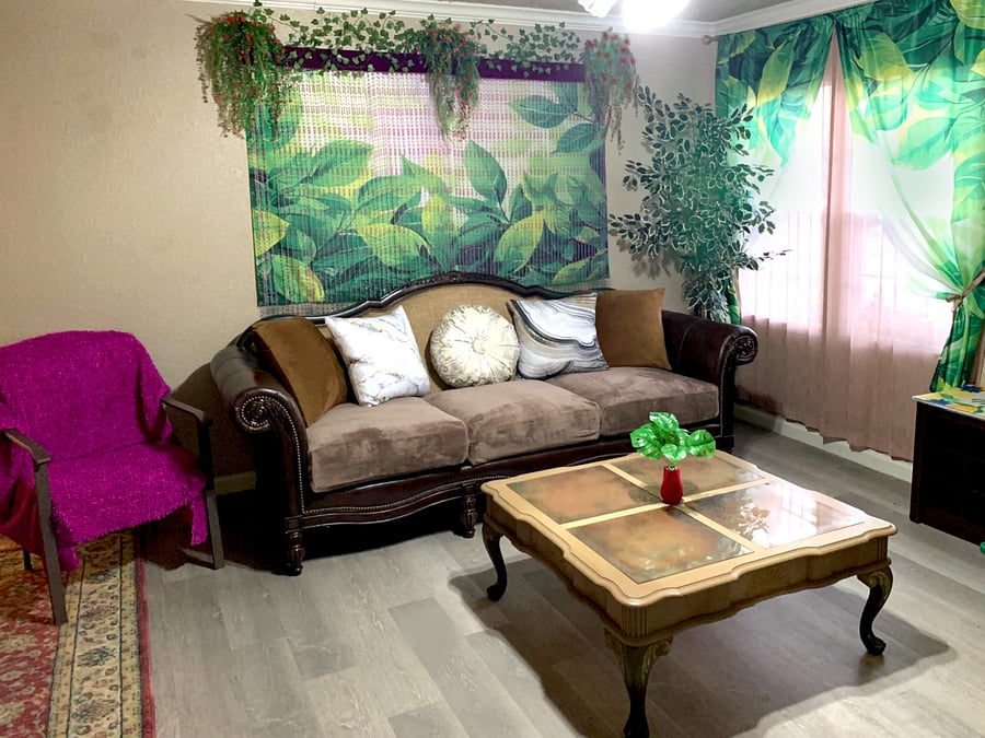 Living room: large sofa the size of a twin bed is ideal for sleeping one person.