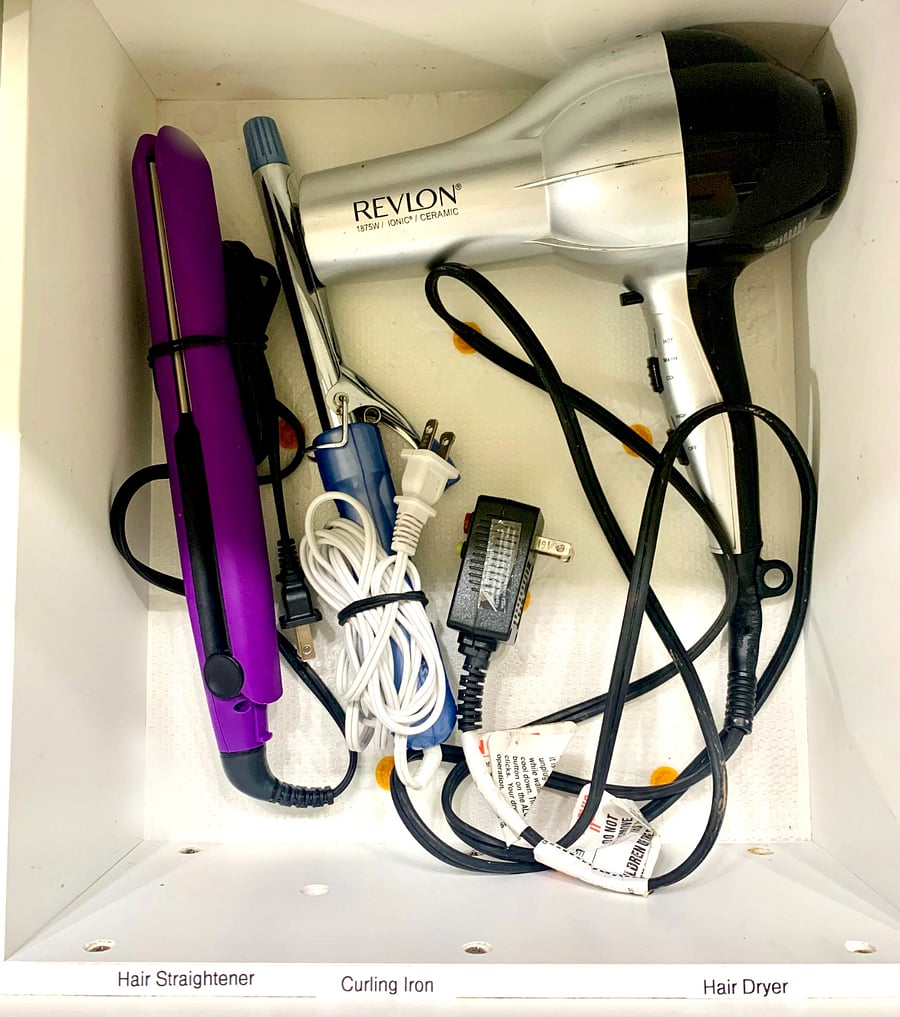 Hair dryer, curling iron, hair straightener.