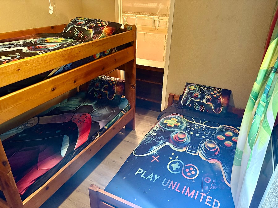 The third small bedroom includes; One Twin size bed and one Twin over Twin bunk bed for 3 lucky kiddos!