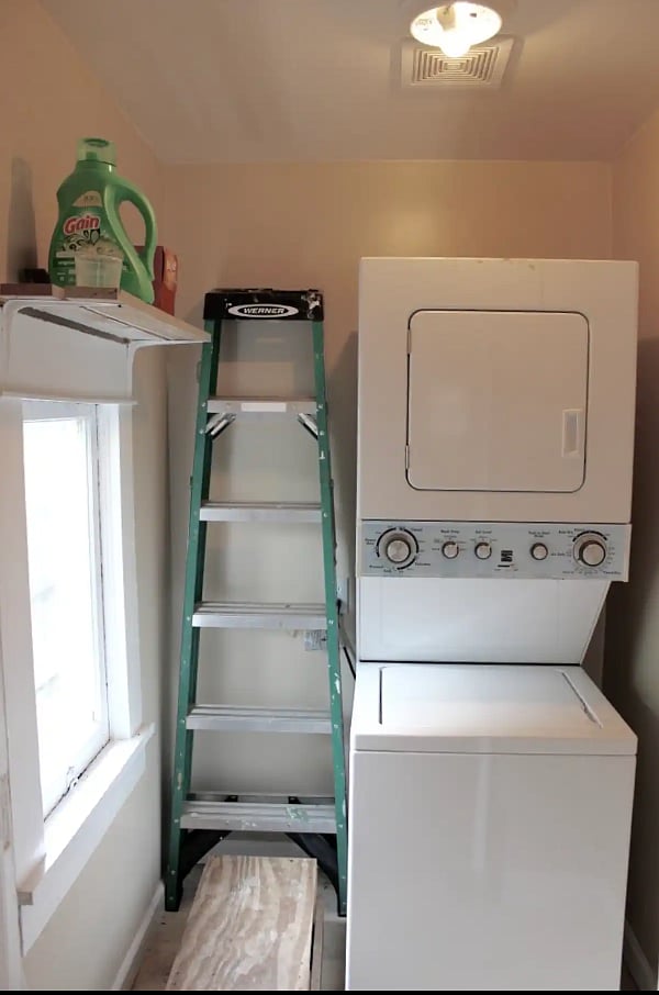 Washer dryer combo in closet off kitchen