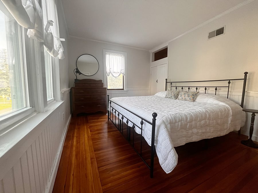 Bedroom 1: Upstairs bedroom with king size bed