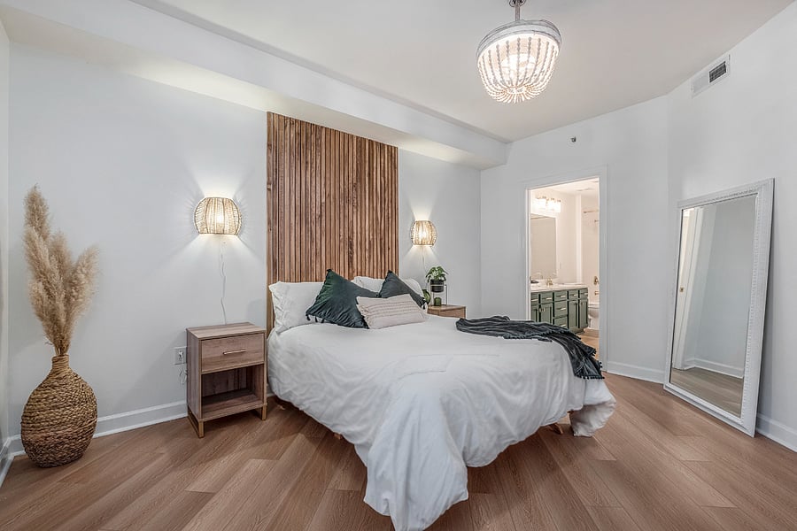 Primary bedroom features queen size bed