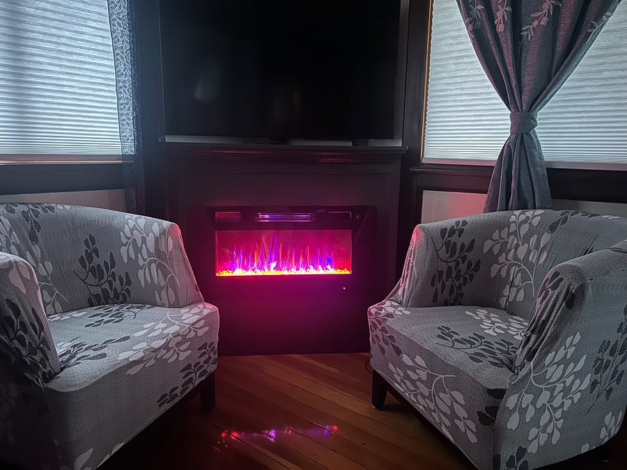 Electric fireplace for cozy TV viewing.
