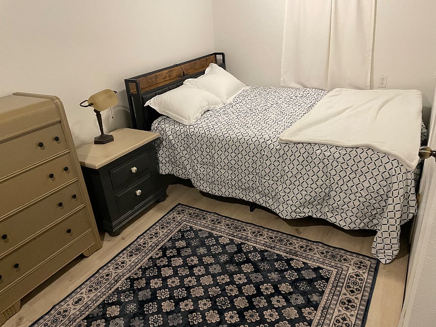 Queen bed downstairs.