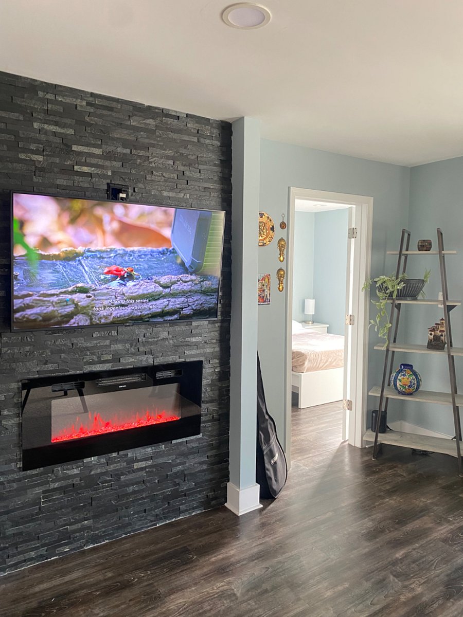 A bright and inviting living area, enhanced by large windows that welcome abundant natural light.
