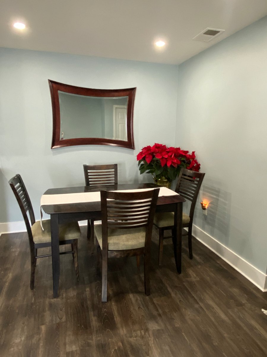 Dining room sits beside the kitchen, offering convenience.