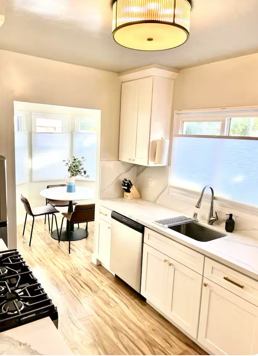 Sunlit kitchen and dining room. Kitchen includes:
-sink with garbage disposal
-Dishwasher
-Gas range and oven
-Microwave
-Coffeemate drip coffee machine
-French press available
-Toaster
-Electric Kettle
-Full set of knives
-Refrigerator