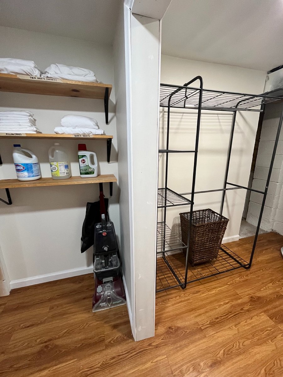 Basement with laundry, gym, and extra storage space