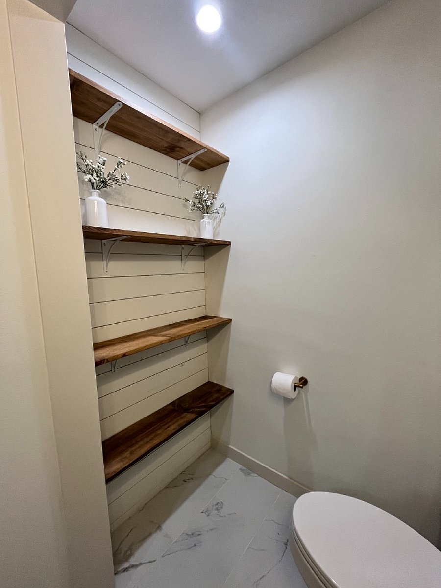 Lots of shelving in the ensuite bathroom