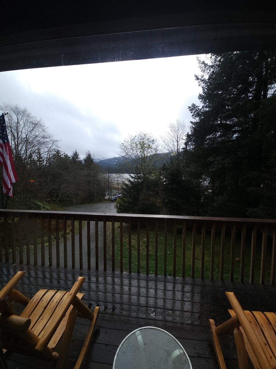 Front deck (wrap around) with log rocking chairs