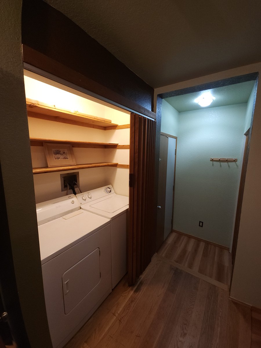 Laundry area in downstairs hallway 