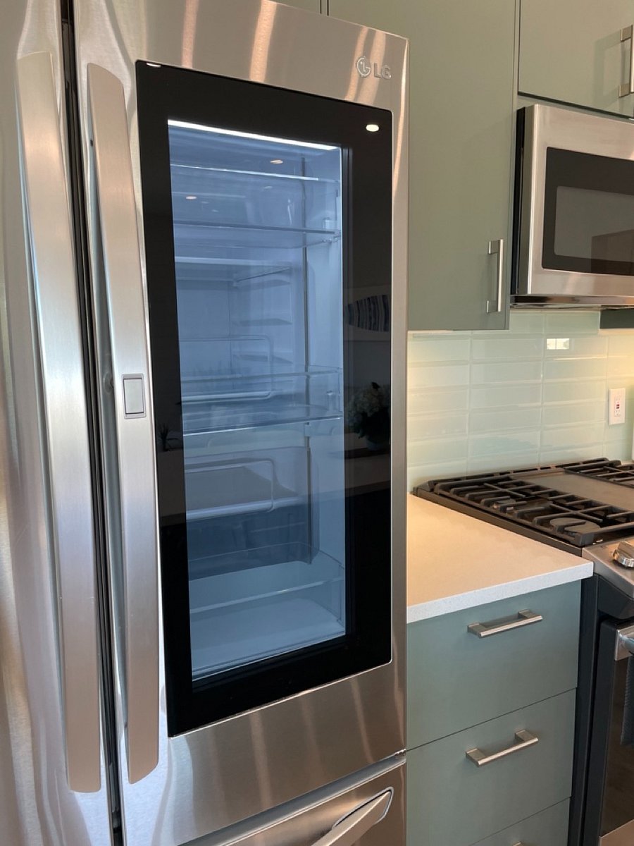 New refrigerator with light up beverage door.