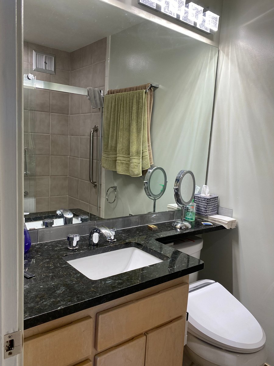Bathroom with full size shower and tub, Bidet with remote. All towels, partial soaps etc.