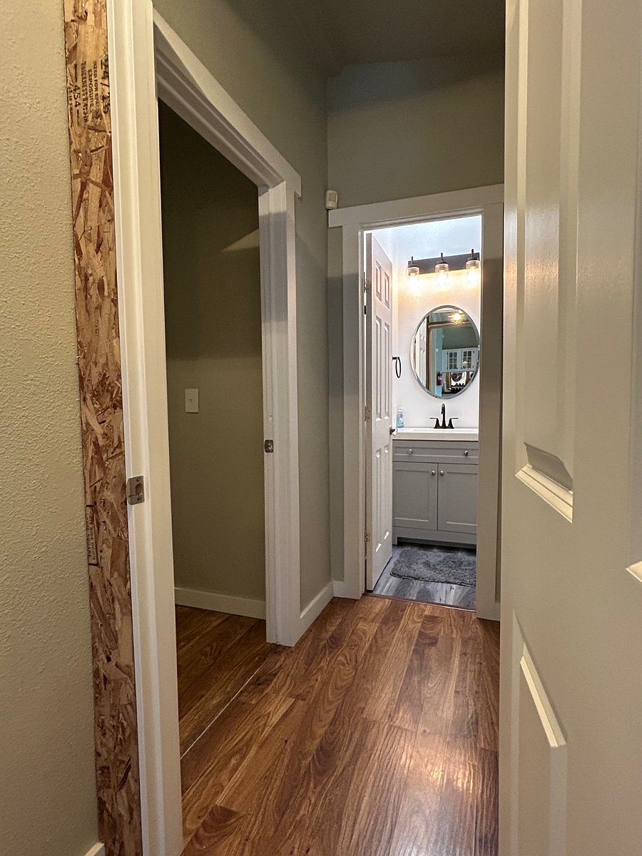 Behind the hallway door, is your private bedroom and bathroom.