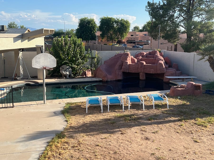 Access to the unheated pool in the back yard