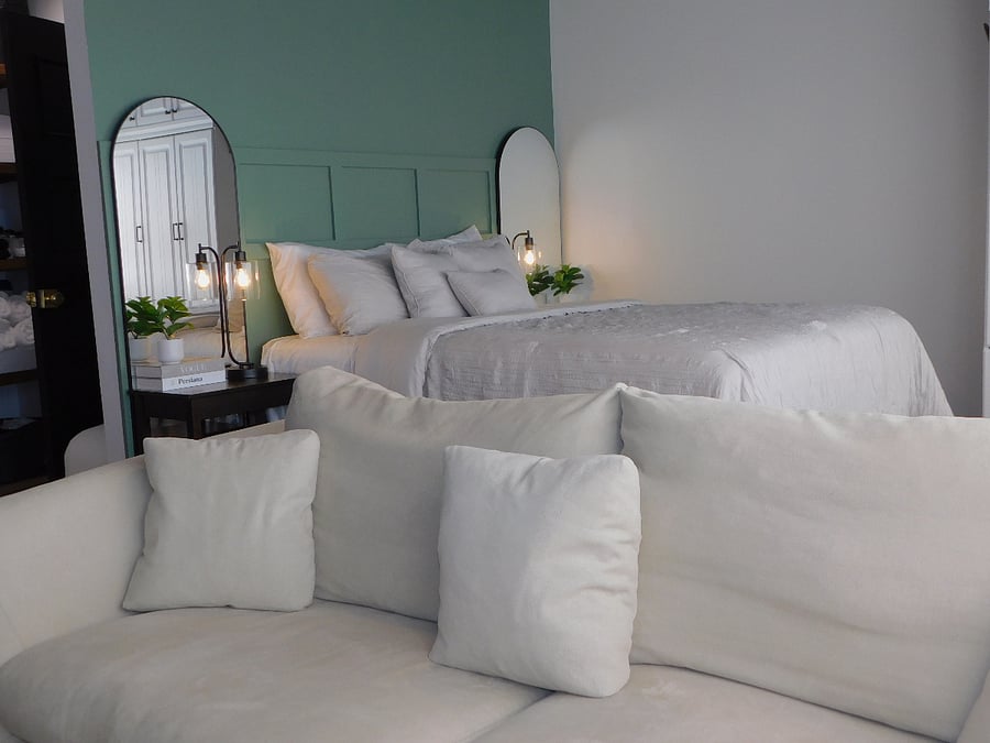 Here's our comfy sofa that comes with an ottoman so you can stretch your legs and relax