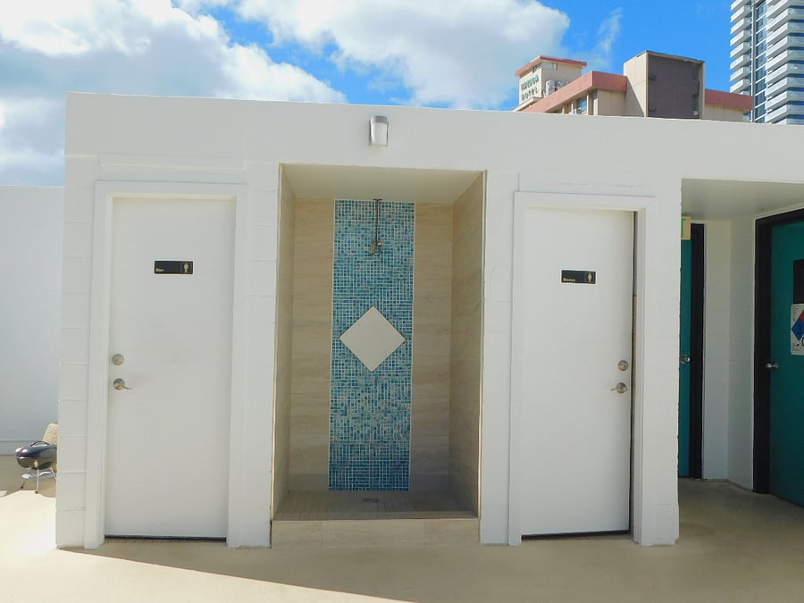 Bathrooms and outdoor shower on pool deck