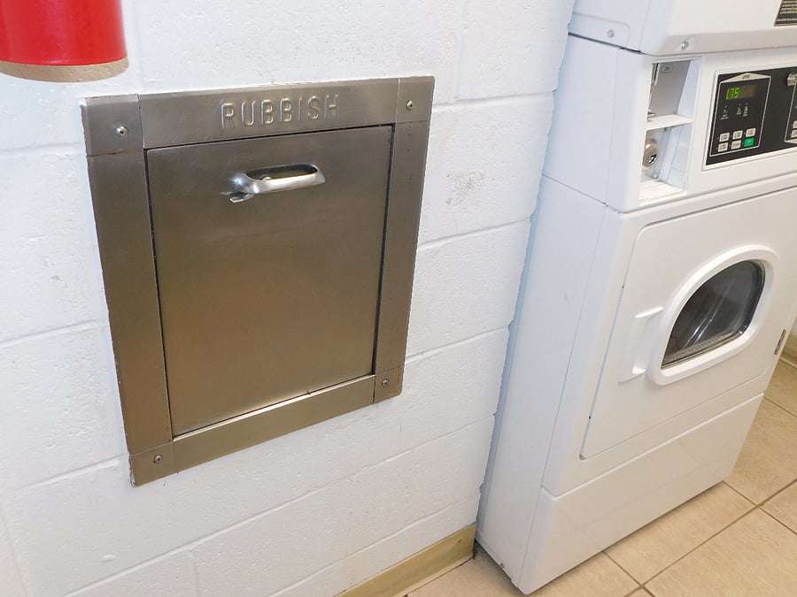 Garbage chute in the laundry room