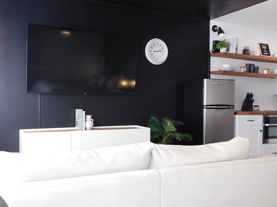 Relax and enjoy your favorite shows on our 55" Smart TV. Under the TV is a large sideboard with more storage space for your needs!