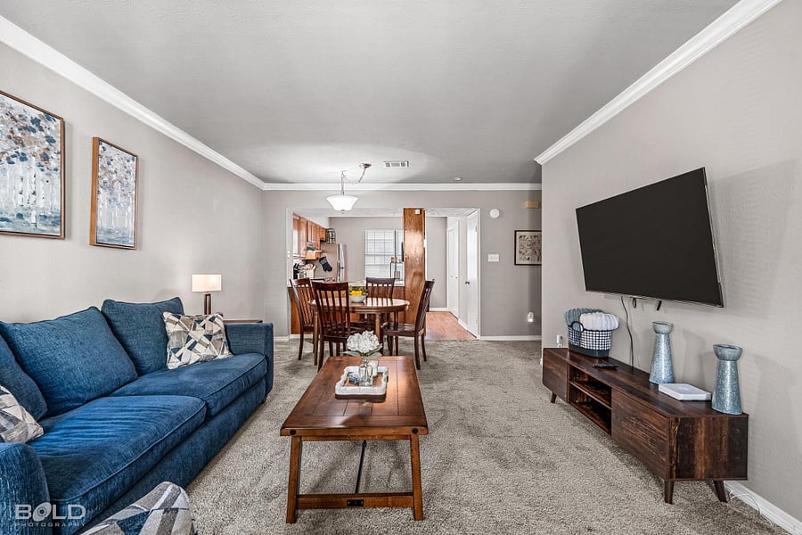 Open concept living, kitchen, laundry and dining area