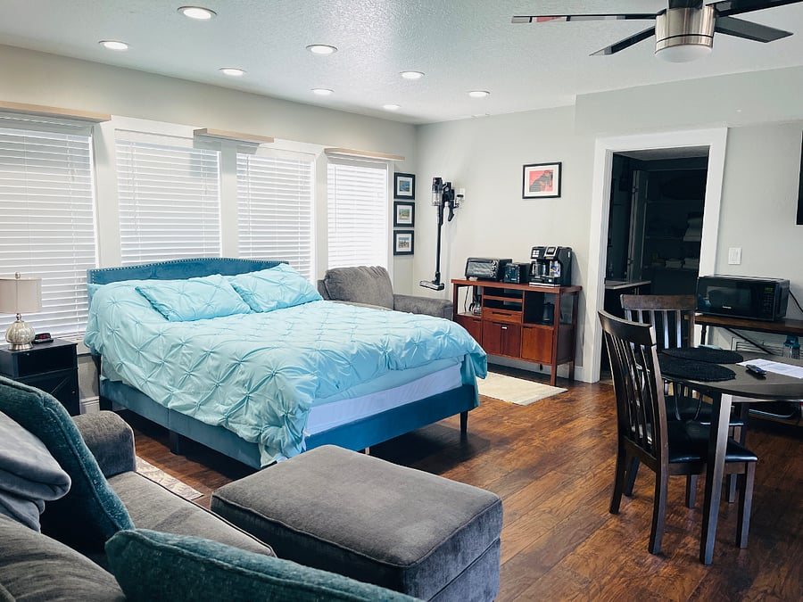 Queen size bed with protective casing for mattress and pillows