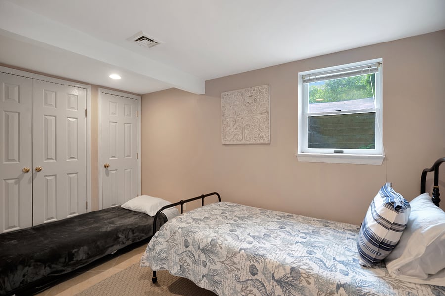 Bedroom with twin bed and extra matress.
