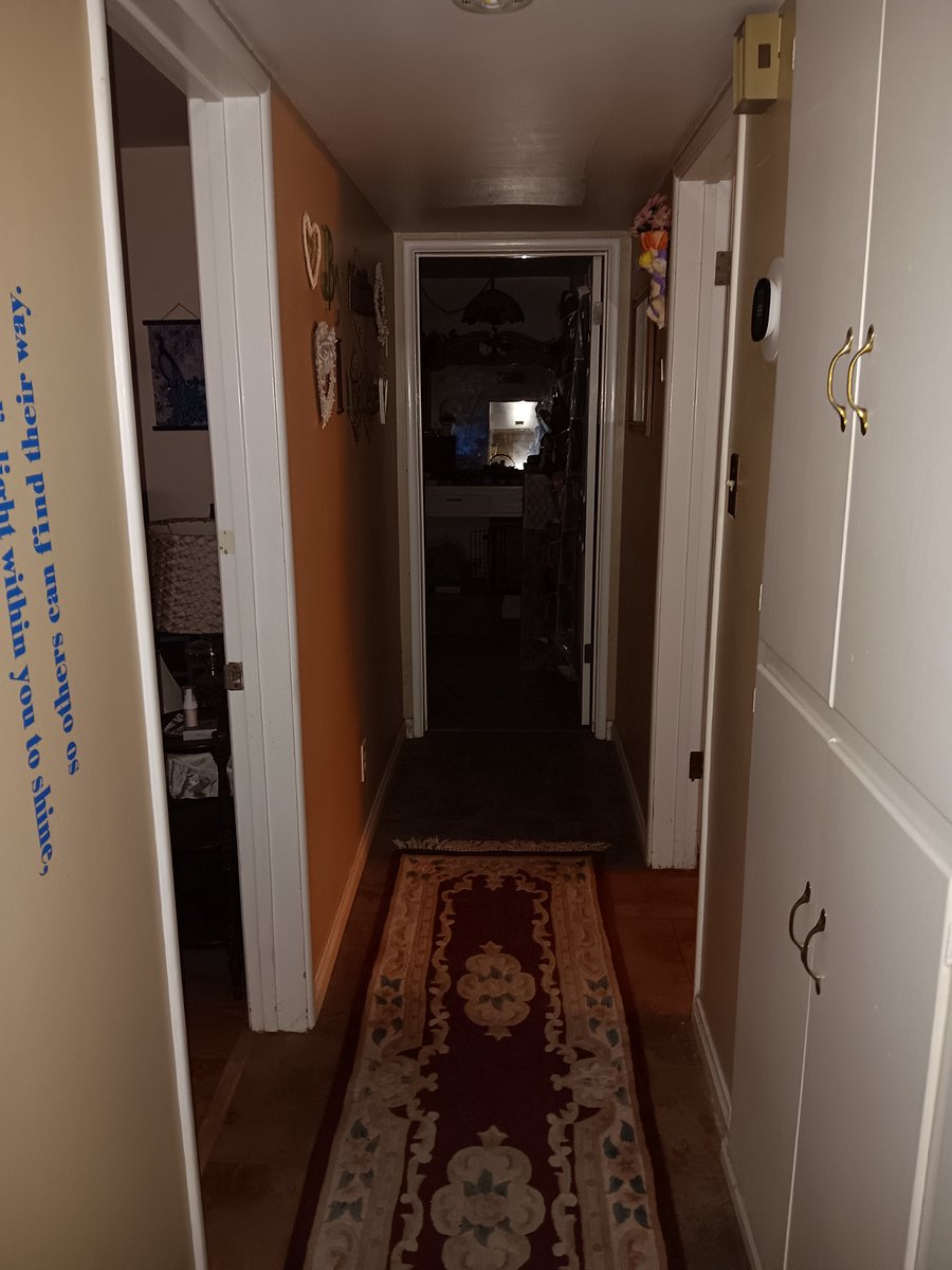 Outside rental room into hallway.