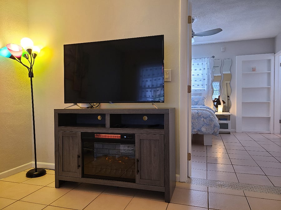 55" screen ROKU and electric fireplace