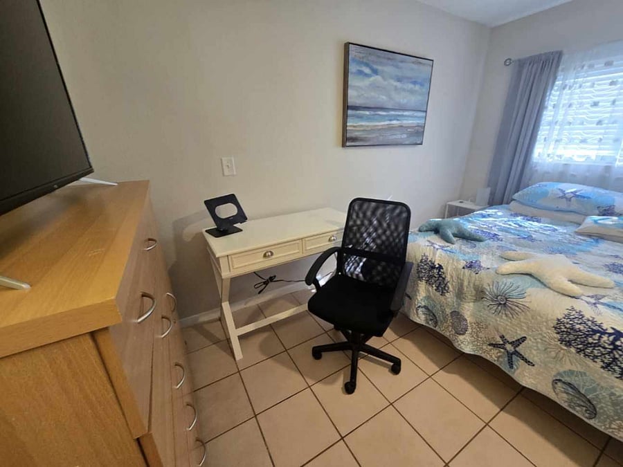 Desk, chair and laptop/tablet holder versatile workspace can easily be moved to living room