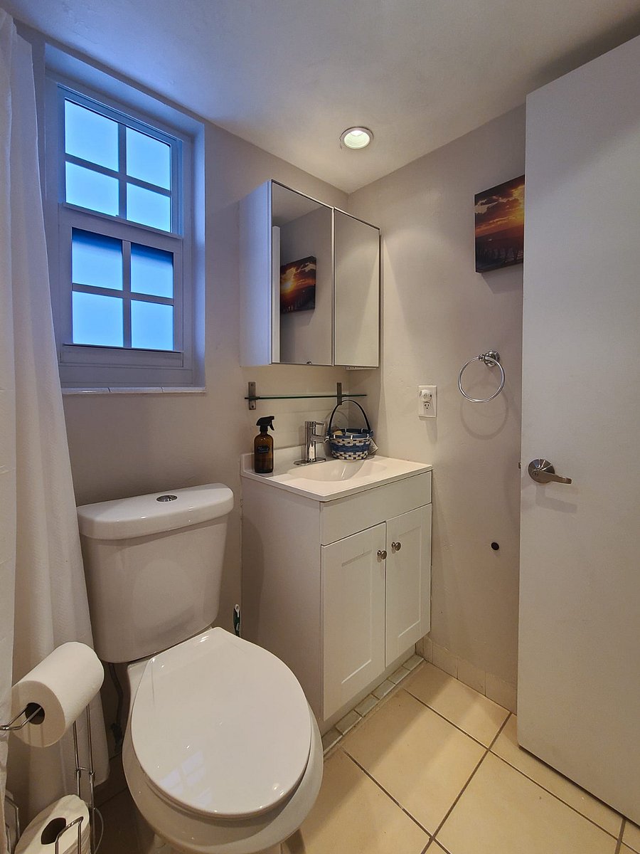 Full bath off entrance, Living Room and Kitchen