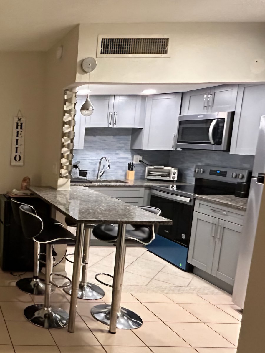Completely renovated kitchen with brand new fridge, stove/airfryer, microwave, dishwasher, etc Feb 2025