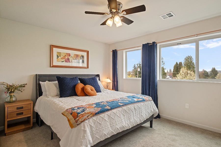 Large Master bedroom with en-suite bathroom. Large closet, ceiling fan and view of the park.