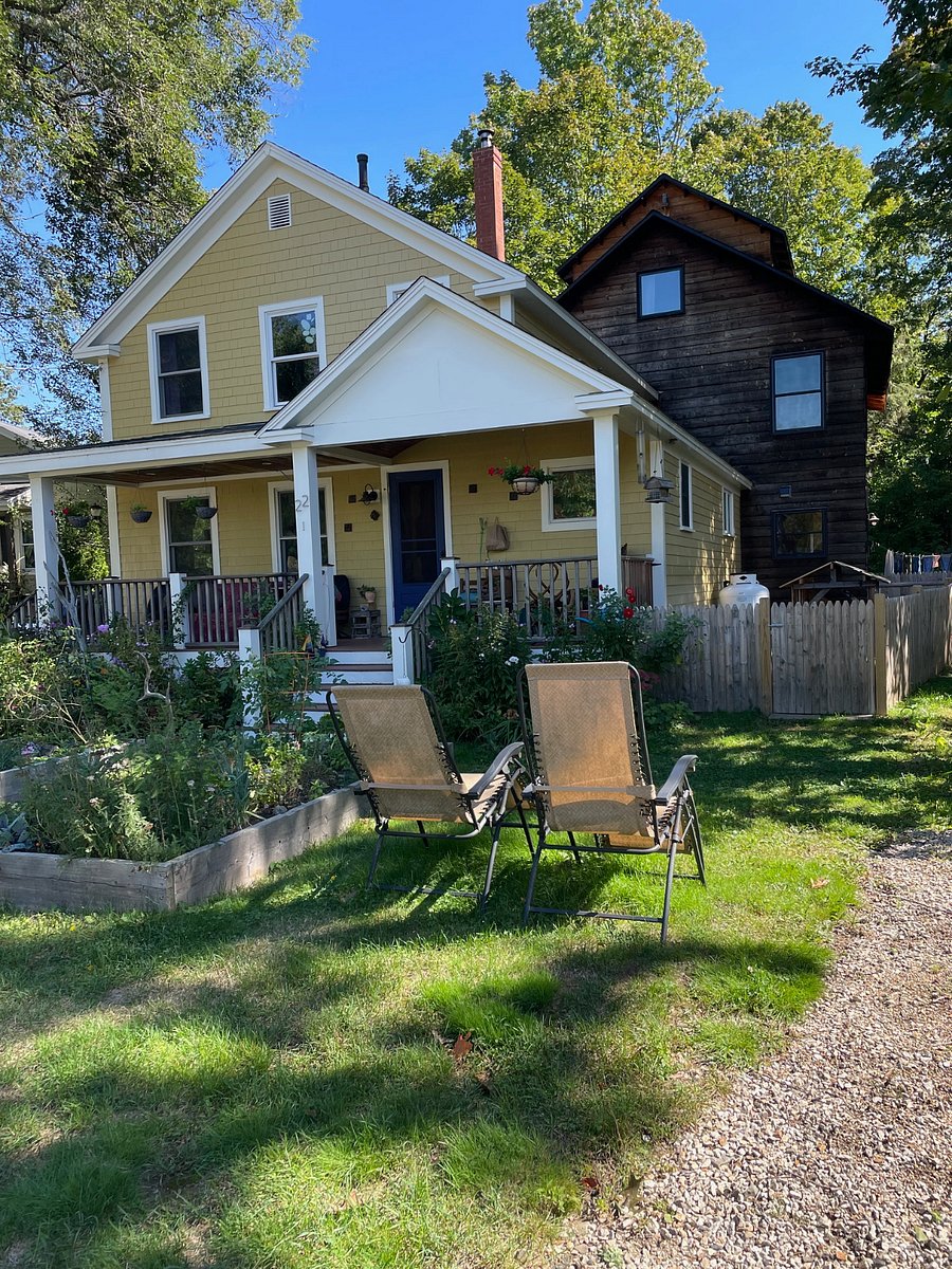 Exterior view showcasing large dog pen.