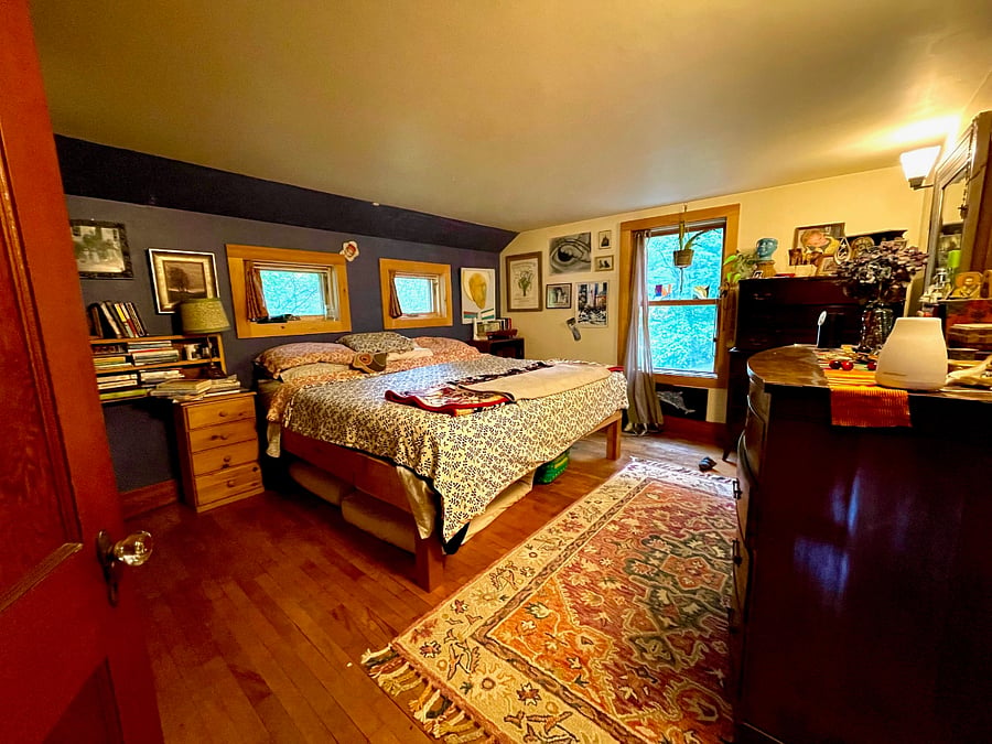 Master bedroom with California king bed