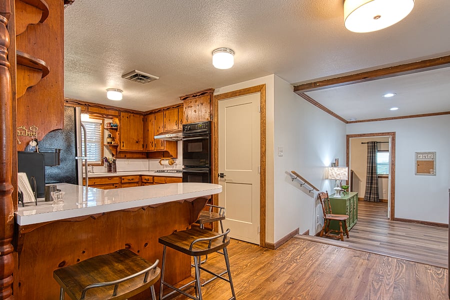 Freshly renovated kitchen with vintage knotty pine cabinets plus pantry. Everything you need to prepare meals along with a full size refrigerator.