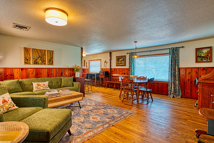 Living/dining with view to breakfast area.
