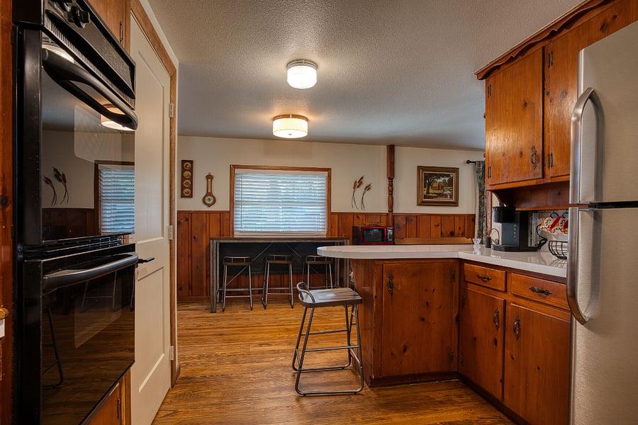 Kitchen looking towards breakfast bar and dining area