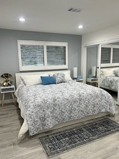 This king size bed almost gets lost in the vast space of the principal bedroom.
