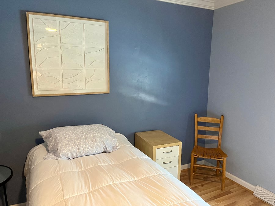 This bedroom includes the furniture for either a twin or a King bed. You decide.