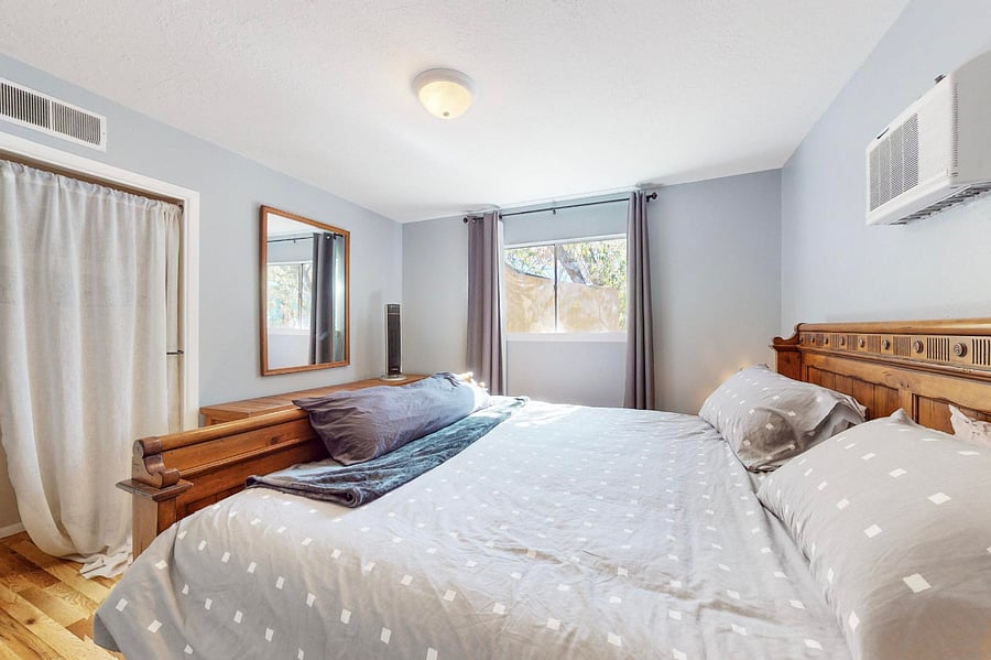 Luxurious king bed with blackout curtains