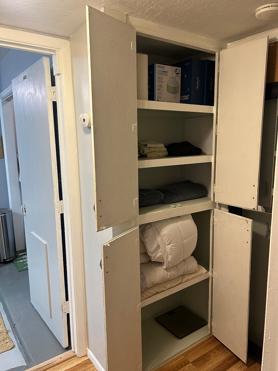 Linen Closet with towels, handcloths, heated blankets, humidifier.