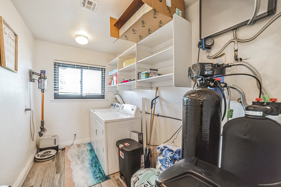 Main house laundry room. Both the main house and the guest house feature whole house water softening and filtration systems